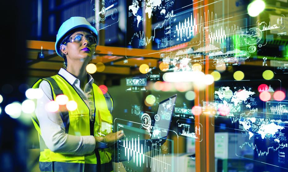 Woman in PPE surrounded by superimposed data